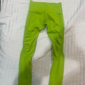 Alphalete Aero leggings in color volt size medium